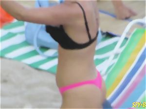 pink bikini inexperienced topless spycam Beach damsels